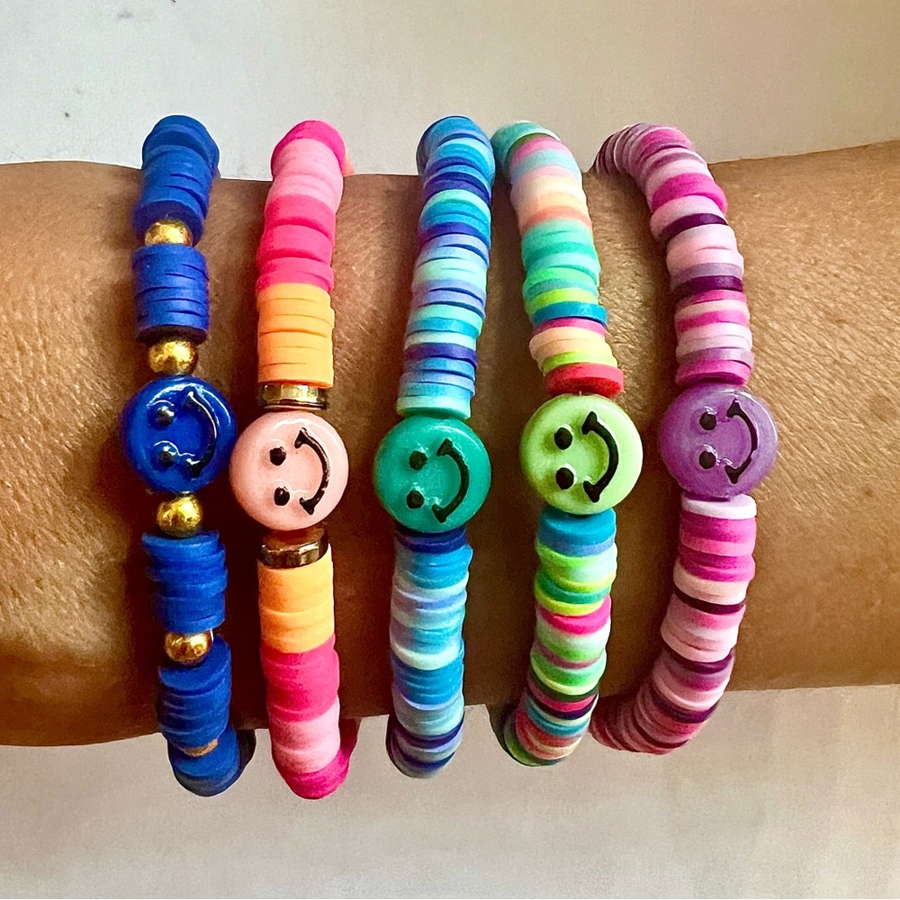 Handmade beaded bracelet stack. Matching set. Smiley face 😀